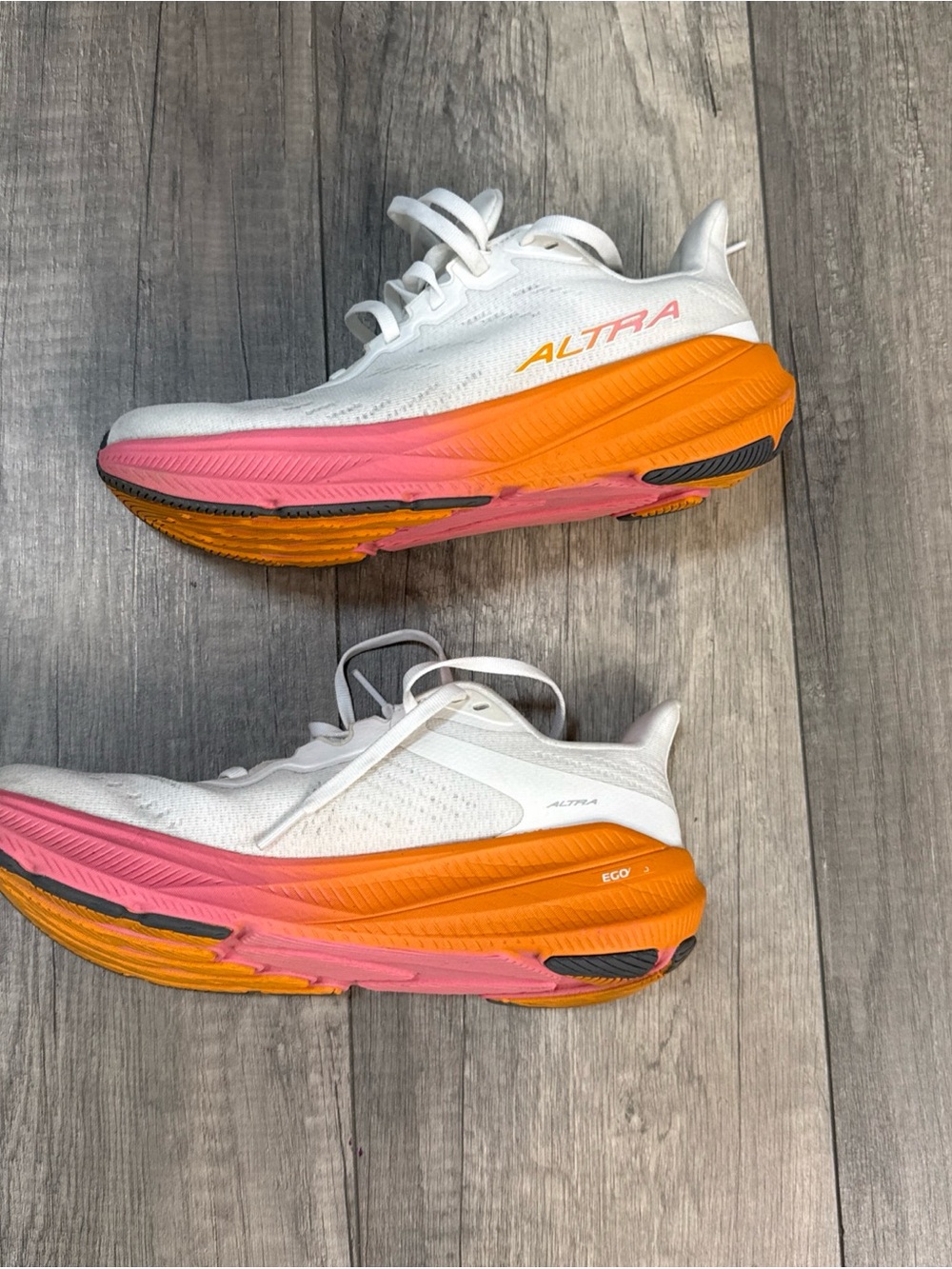 Altra Women's White Running Shoes with Pink-to-Orange Gradient Midsole - Picture 2 of 8